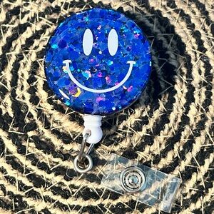 Blue Smiley Face Badge Reel